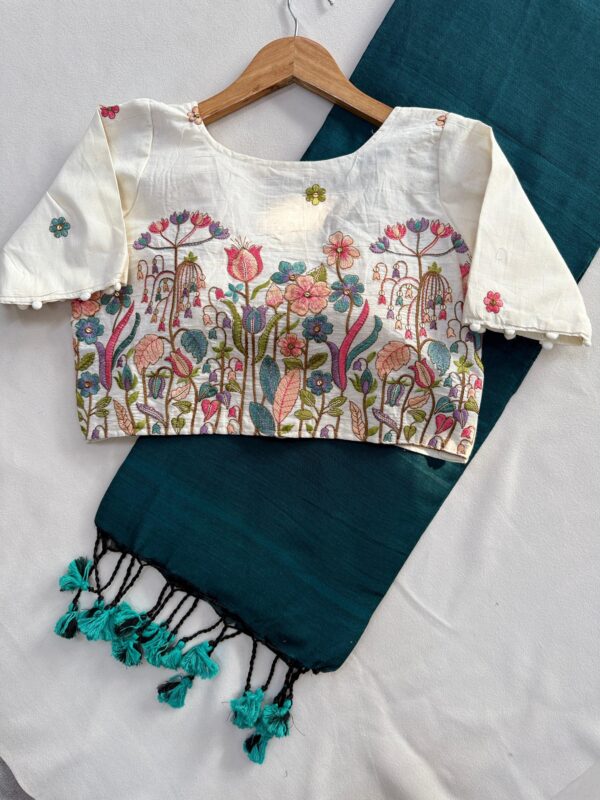 khadi cotton saree paired with a white embroidered readymade blouse. for women festive wear