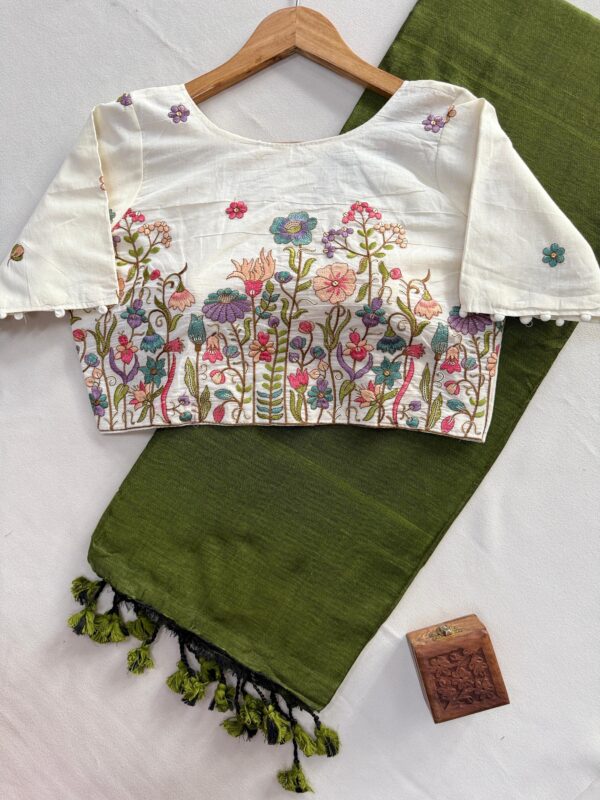 khadi cotton saree paired with a white embroidered readymade blouse. for women festive wear