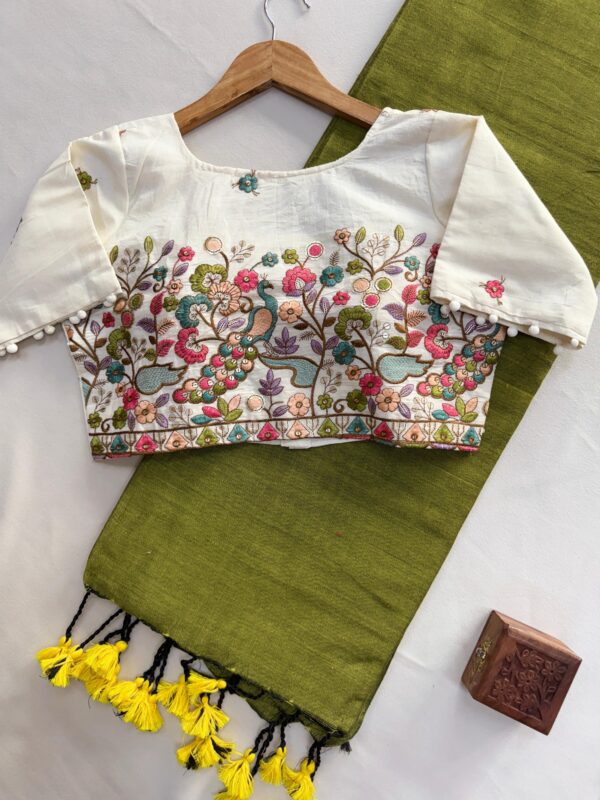 khadi cotton saree paired with a white embroidered readymade blouse. for women festive wear