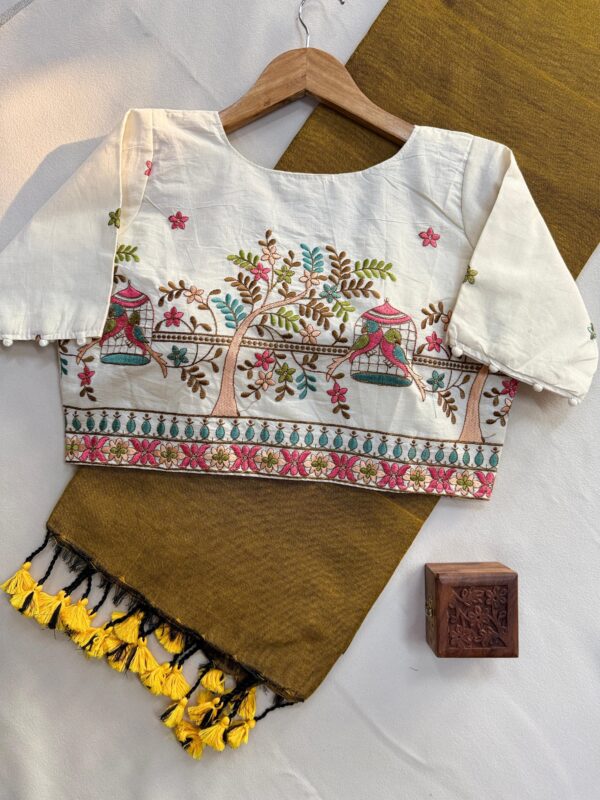 khadi cotton saree paired with a white embroidered readymade blouse. for women festive wear