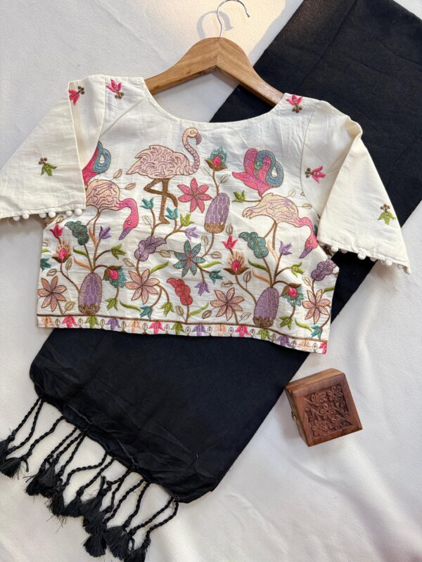 khadi cotton saree paired with a white embroidered readymade blouse. for women festive wear