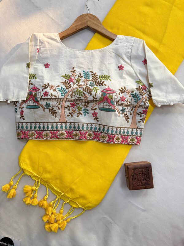 khadi cotton saree paired with a white embroidered readymade blouse. for women festive wear