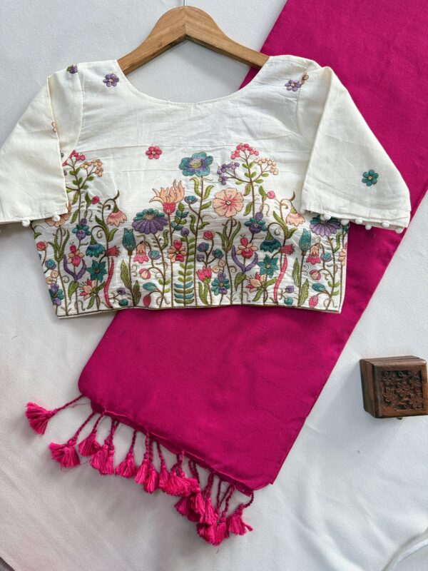 khadi cotton saree paired with a white embroidered readymade blouse. for women festive wear