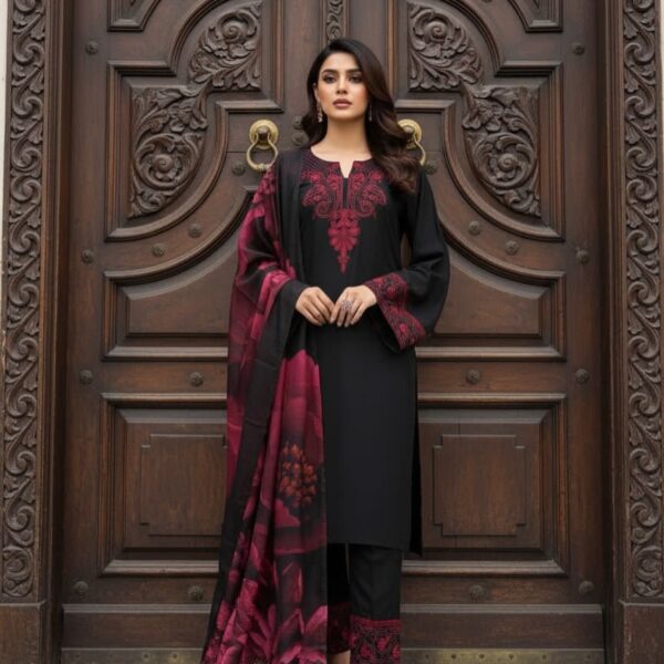 Woman wearing black kurta with red embroidery and matching printed dupatta, paired with black pants for women festive wear