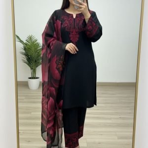 Home Woman wearing black kurta with red embroidery and matching printed dupatta, paired with black pants for women festive wear