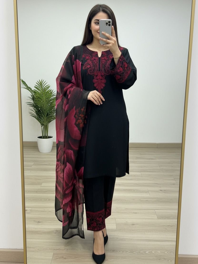 Home Woman wearing black kurta with red embroidery and matching printed dupatta, paired with black pants for women festive wear