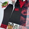 Woman wearing black kurta with red embroidery and matching printed dupatta, paired with black pants for women festive wear