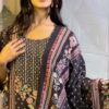 Woman wearing black floral printed kurta set with detailed dupatta and matching pants for women festive wear