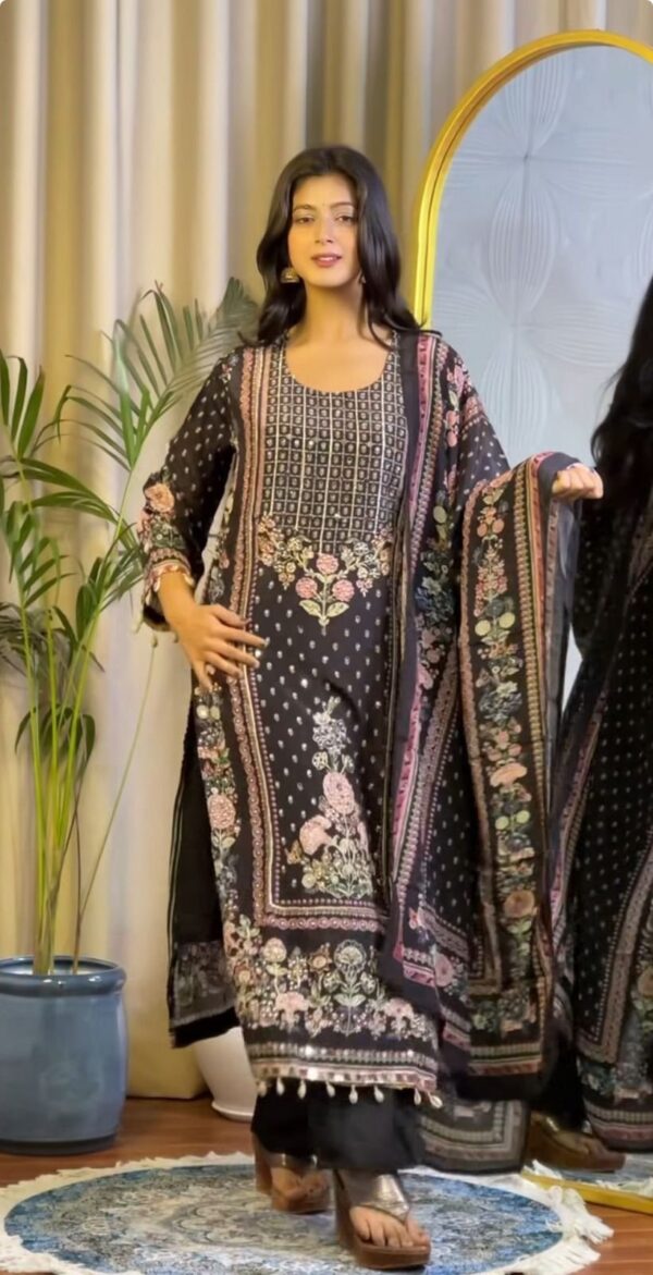 Woman wearing black floral printed kurta set with detailed dupatta and matching pants for women festive wear