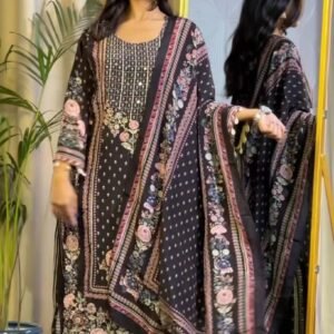 Woman wearing black floral printed kurta set with detailed dupatta and matching pants for women festive wear