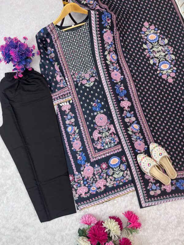 Woman wearing black floral printed kurta set with detailed dupatta and matching pants for women festive wear