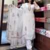 white embroidered kurta set with matching pants and floral printed dupatta for women festive wear