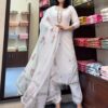 white embroidered kurta set with matching pants and floral printed dupatta for women festive wear