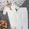 white embroidered kurta set with matching pants and floral printed dupatta for women festive wear