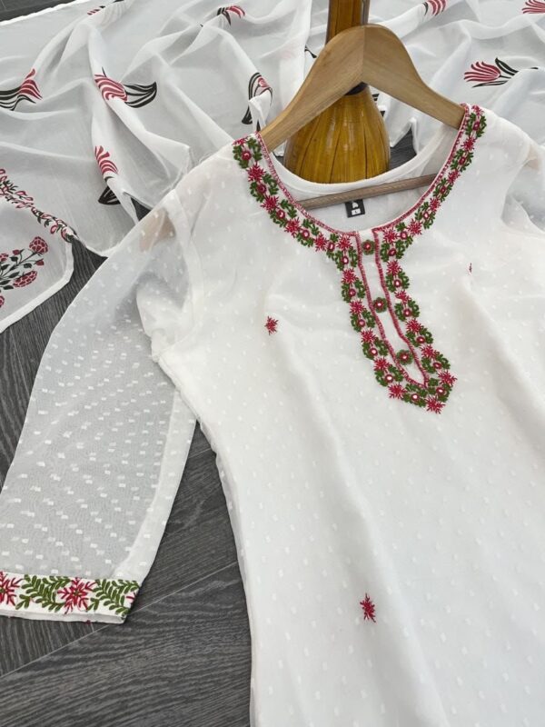 white embroidered kurta set with matching pants and floral printed dupatta for women festive wear